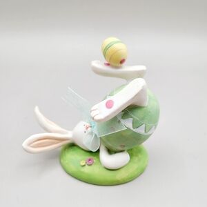Playful Bunny Figurine with Balancing an Easter Egg